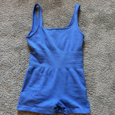 Tuta short a coste blu