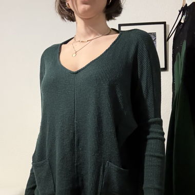 Grüner Strickpulli