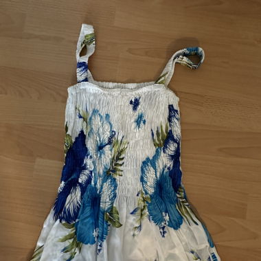 white beach dress with blue flowers