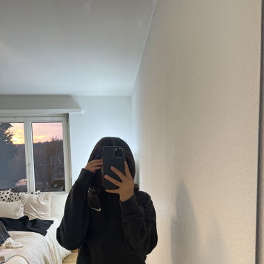 Schwarzer Nike Hoodie