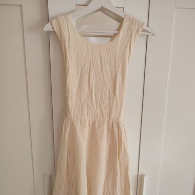 Cream dress with open back