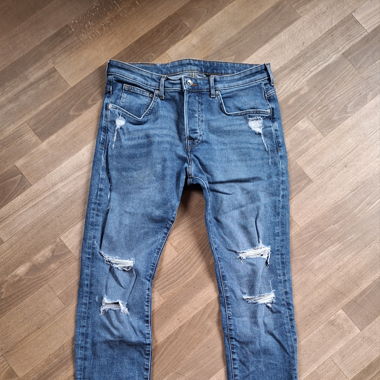 ripped blue jeans 