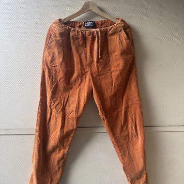 Pantalon en velours côtelé orange de Cotelé Paris