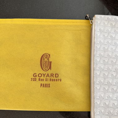 Pochette con zip Goyard