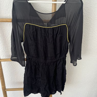 Black sheer romper with pockets