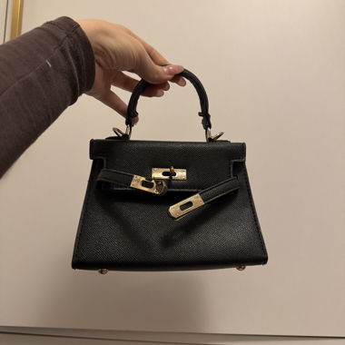 Black handbag with lock