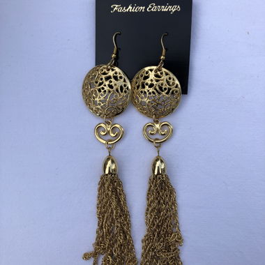 Boucles d’oreilles dorées statement