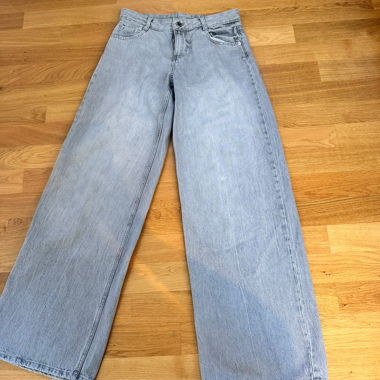 Jeans ampi grigi a vita bassa