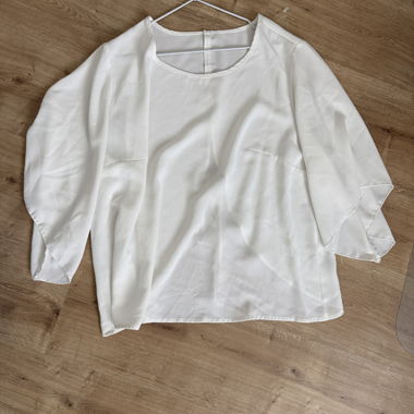 White satin blouse with lacing at the back