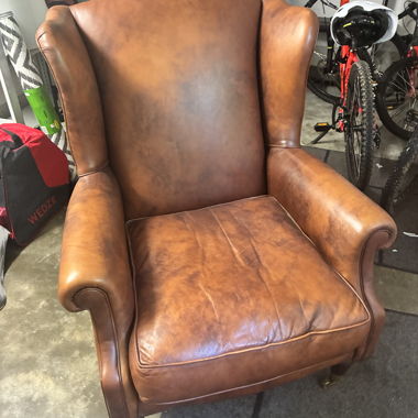 Brown leather armchair