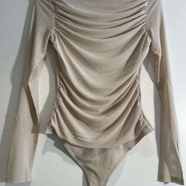 Beige long sleeve ruched bodysuit
