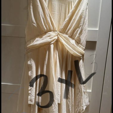 Beige Dress with Deep Neckline
