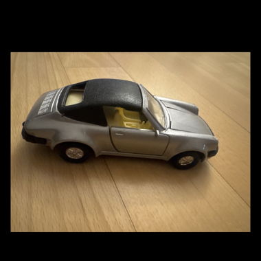Small silver toy car