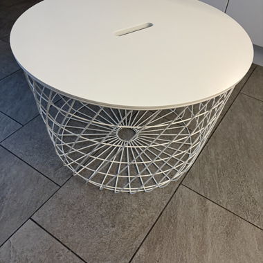 Round white side table