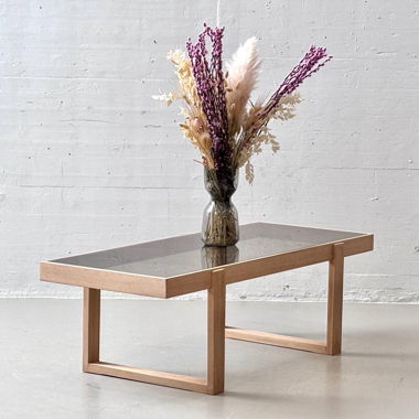 Beech coffee table with smoked glass top