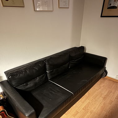 Schlafsofa black eco-leather with defect 
