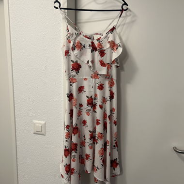 White summer dress with floral pattern