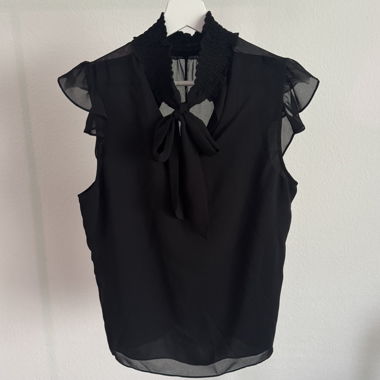 Blusa in chiffon nera