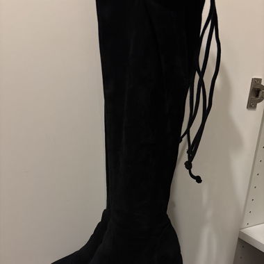 Bottes cuissardes jusqu’au genou