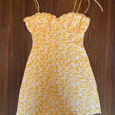 Abito bustier giallo con fiori
