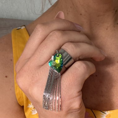 Silver-tone ring with green heart and tassels