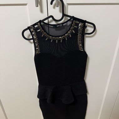 Black Dress with Jewelry Details