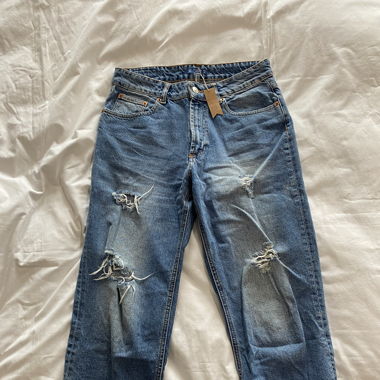 Jeans déchirés délavés 