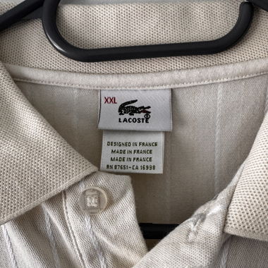 Polo Lacoste beige à rayures