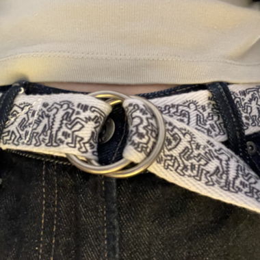 Adjustable white belt with Keith Haring characters