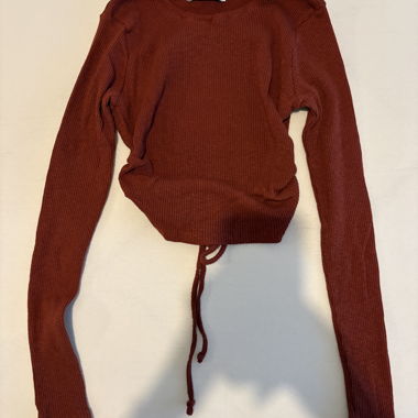 Maglione con schiena scoperta