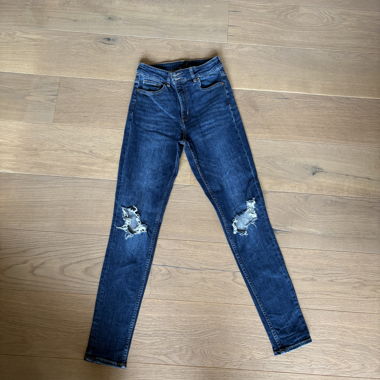 Jeans strappati