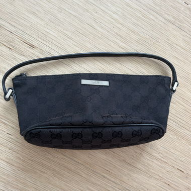 Gucci black baguette handbag