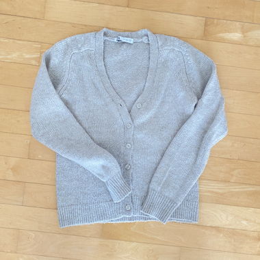 Gilet en maille beige à encolure en V