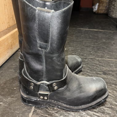 Black leather boots with strap