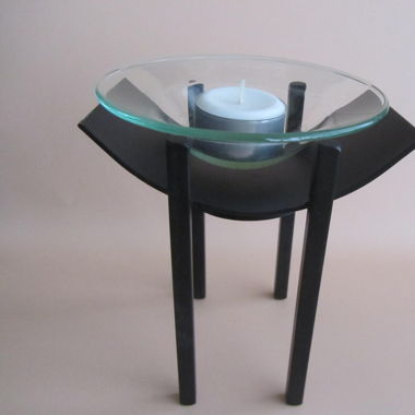 Candle holder in black metal with glass bowl