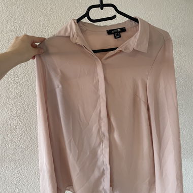 Blusa rosa con colletto