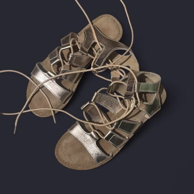 Gold gladiator sandals with laces
