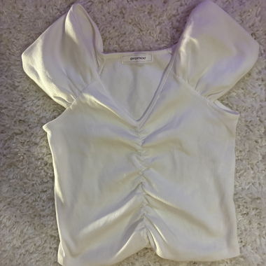 Top bianco con ruches Promod