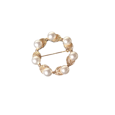 Gold-Brosche mit sieben Perlen