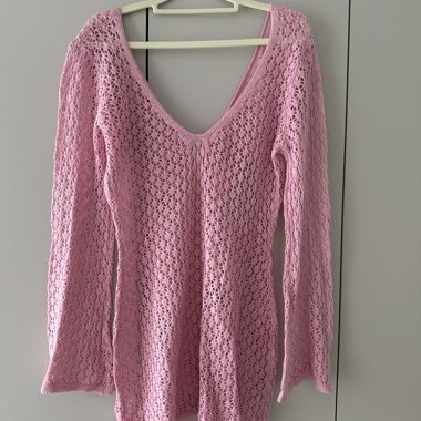 Maglione in maglia rosa con scollo a V