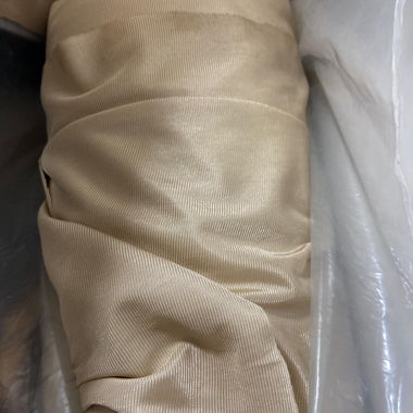 ROLLS OF HEAVY FABRIC MATERIAL 