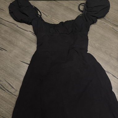 Black mini dress with puff sleeves