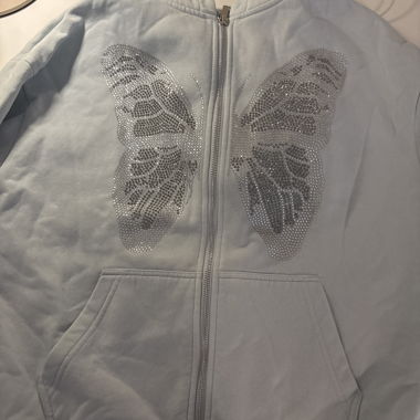 Felpa con zip farfalla