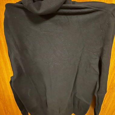 Maglione nero a collo alto