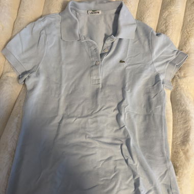 Polo Lacoste bleu clair