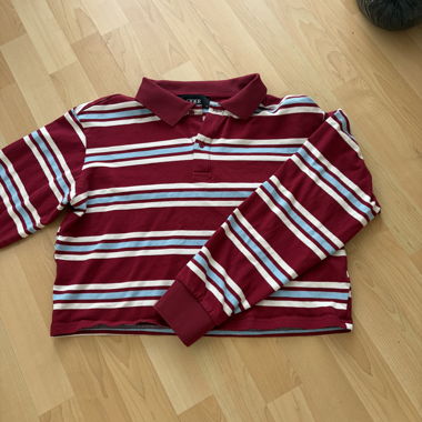 Polo a maniche lunghe a righe