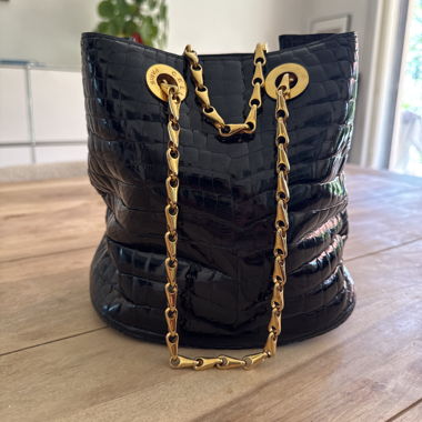 Black bucket bag with golden chain Celine