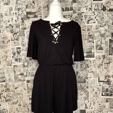 Short jumpsuit with detailing