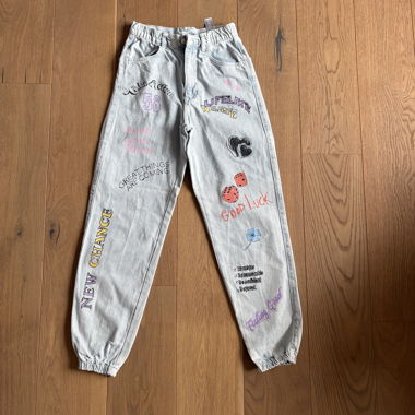 Jeans con disegni