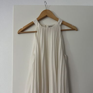 Top con volant colore crema